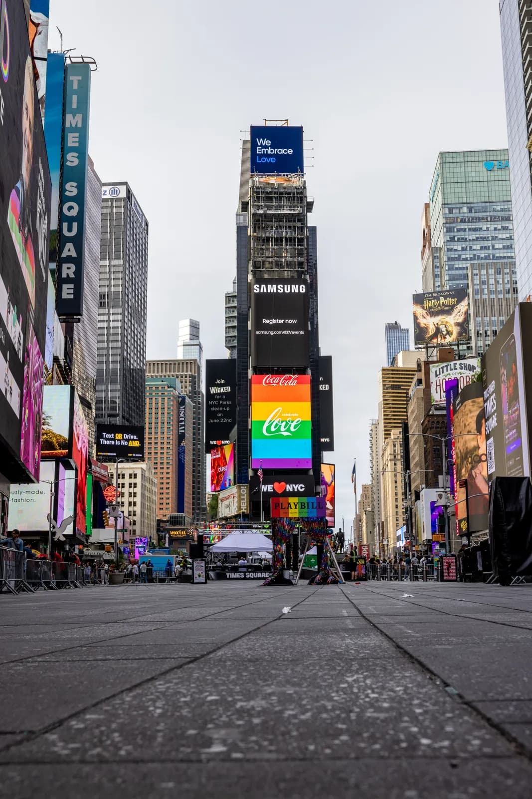 Times square new york city street view with digital billboards and pride month rainbow signage